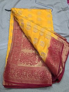 Vibrant Yellow Silk Saree with Red Border