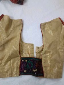 Elegant Gold Blouse with Red Trim