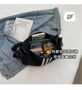 Sporty Black Crossbody Bag with White Stripes