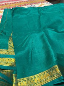 Elegant Teal Saree with Gold Border