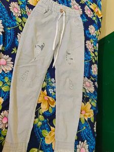 Stylish Light Blue Jeans with Fun Graphics
