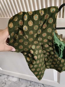 Elegant Green Saree with Gold Accents