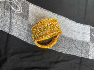 Traditional Gold Bangles with Intricate Floral De
