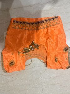 Orange Lehenga Choli with Blue Dupatta