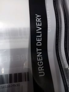 DELHIVERY Courier Bag With Attached Shipping labe