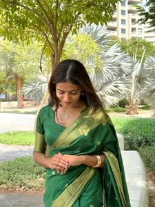 Elegant Green Saree with Gold Border