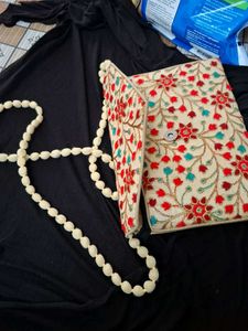 Embroidered sling Bag