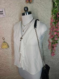 Chic White Sleeveless Ruffle Top