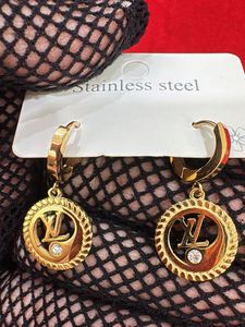 Gold Tone Hoop Earrings with Crystal Accent