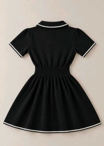 BLACK FIT AND FLARE DRESS WITH WHITE TRIM