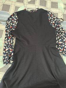Chic Black Dress with Floral Sleeves