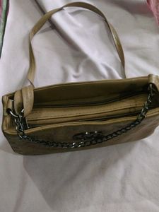 Stylish Beige Shoulder Bag with Chain Detail