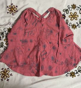 Peach peplum top