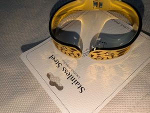 Elegant Gold Tone Bangle Bracelet