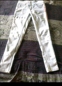 White Jeans and Embroidered Shirt