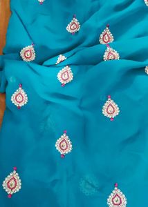 Teal Embellished pearl border Saree