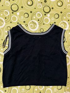 Sleeveless Black Top with Striped Neckline