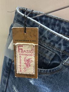 Distressed Blue Denim Jeans
