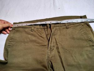 olive green or subtle brown shade pant of 32 size