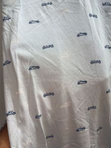 Light Blue Polo Shirt with Car Print