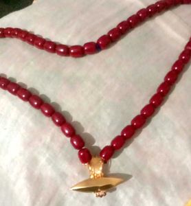Red Beaded Necklace with Gold Pendant