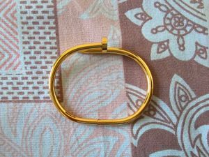 Gold Tone Nail Bracelet