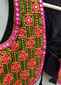 Designer Embroidered shrug.
