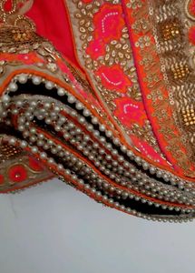 Beautiful Embroidered Red Saree with Orange Blouse