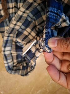 Plaid Pleated Skirt with Buckle Detail