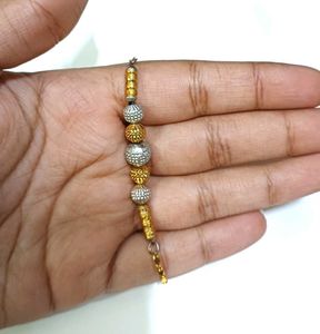 Elegant Gold and Silver Beaded Bracelet