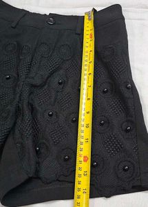Chic Black Eyelet Shorts with Embellishments