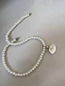 Elegant Faux Pearl Necklace with Shell Charm