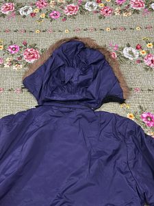 Stylish Blue Winter Jacket with Fur Hood