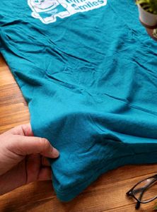 Teal "One Team, Infinite Smiles" T-Shirt