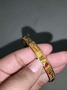 Elegant Gold Tone Bangles with Stones