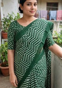 Elegant Green Saree with White Zigzag Print