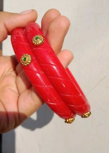 Vibrant Red Bangles with Gold Accents