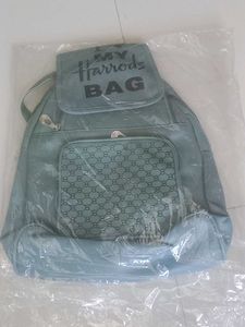 Stylish Blue Backpack with "I Love My Harrods Bag"