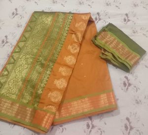 Saree with blouse piece.
