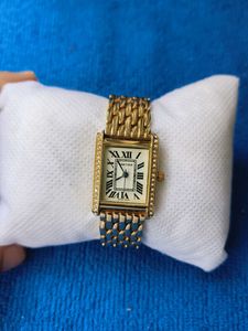 Elegant Gold Watch with Diamonds