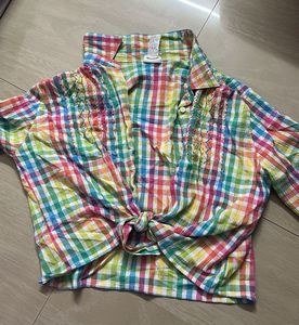 multicoloured shirt with a tie knot