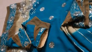 Stunning Teal Blue Saree with Silver Embellishment