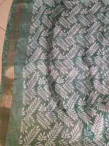 Elegant Green Saree with White Leaf Print