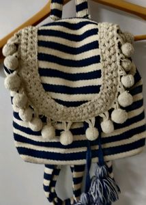 🎀A STYLISH STRIPPED BACKPACKWITH POM-2 DETAILING