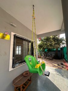 Kids Green and Yellow Swing