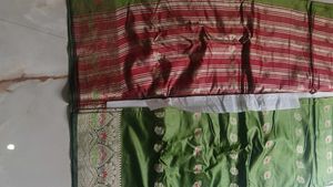 Elegant Green Saree with Maroon Border