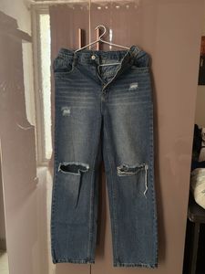 Distressed Blue Denim Jeans