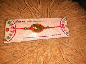 Resin Rakhi with Pearl Beads
