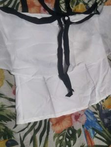 White Ruffle Top with Black Accents