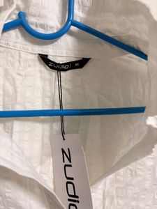 White Sleeveless Top